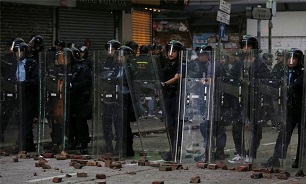 Hong Kong Riot Police Move to Curb Airport Protest after Violent Clashes