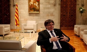 Spain Issues Arrest Warrant for Catalan Leader