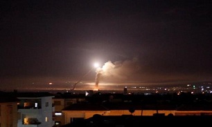 Syria air defenses down Israeli missiles over Homs